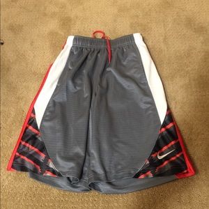 Gray red and white nike basketball shorts
